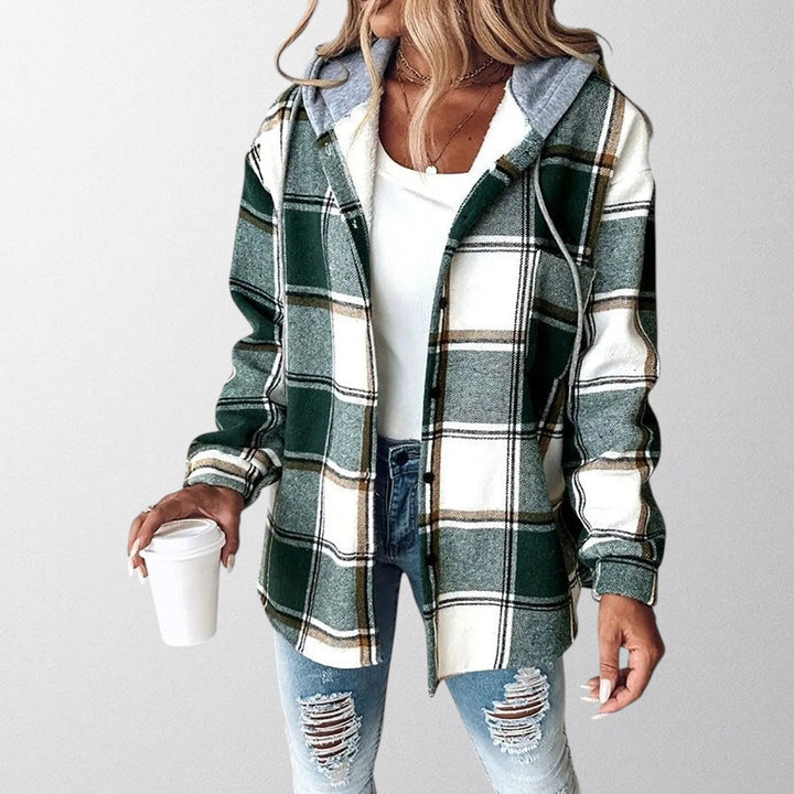 Woman wearing a stylish hooded jacket. Cozy outerwear for fall & winter everyday comfort & casual fashion.