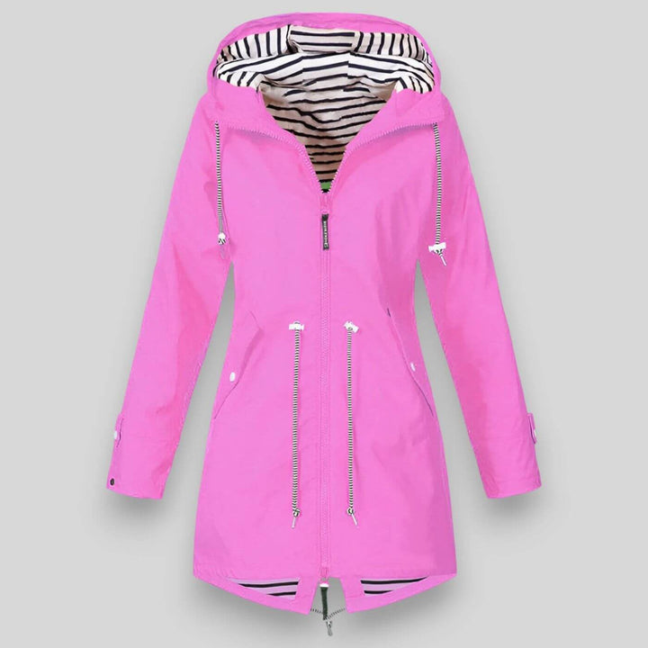 Zip-up women's hooded jacket with adjustable waist, a stylish and comfortable choice for casual wear.