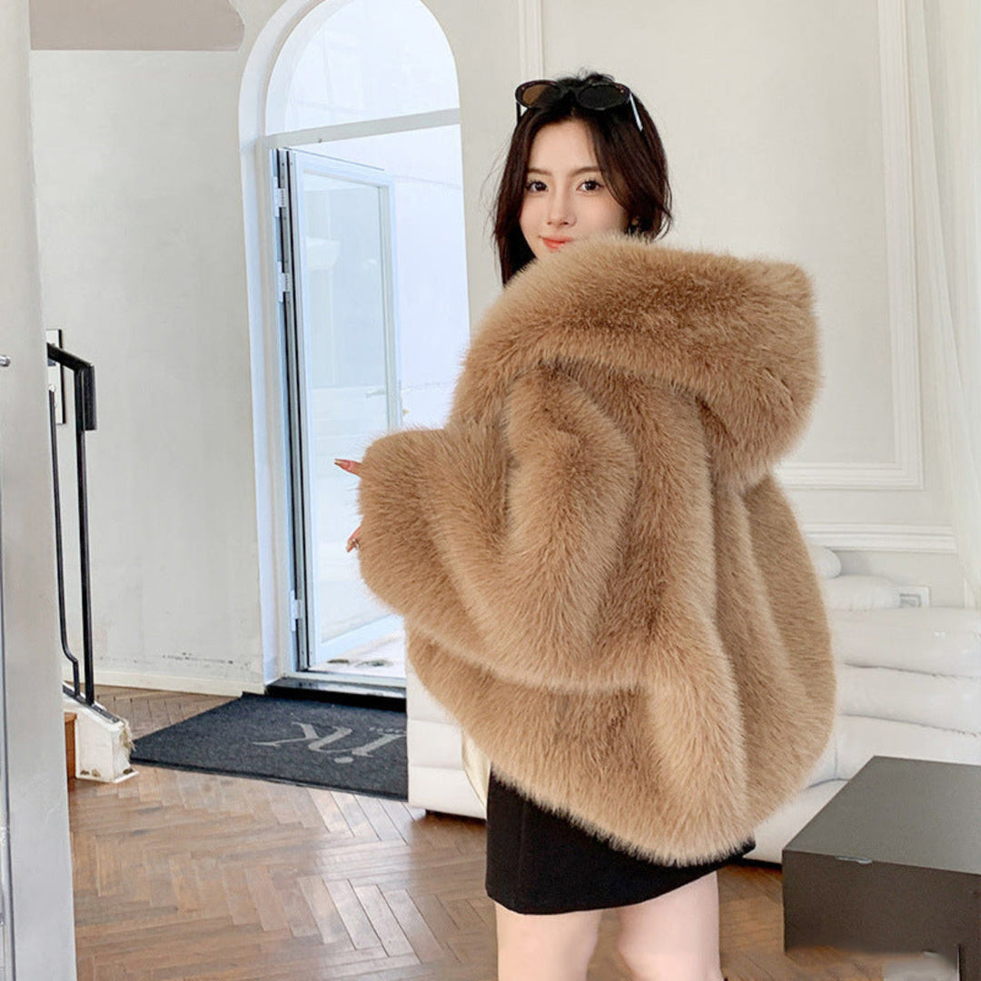 Casual women's hooded long sleeve faux coat. Comfy and stylish outerwear for everyday fall and winter wear.