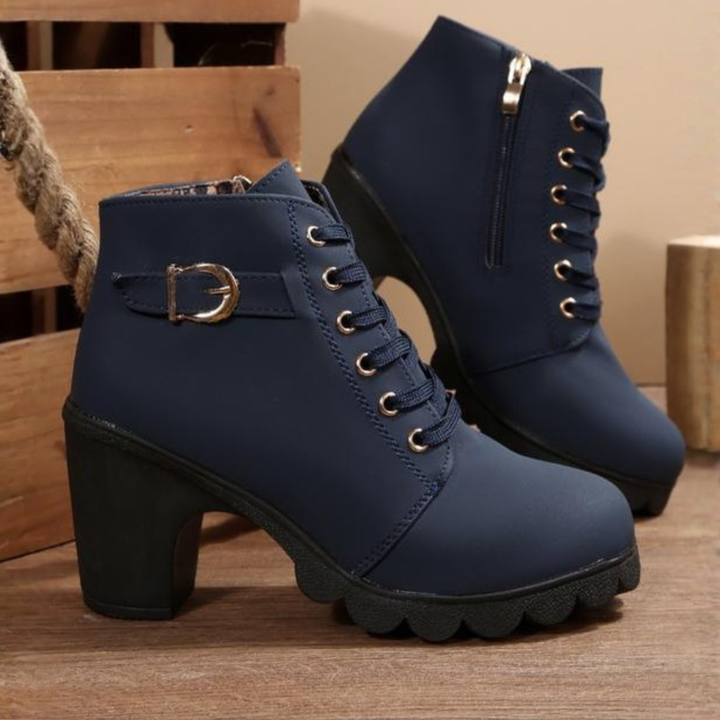 Fashionable women's ankle boots with a prominent block heel and classic lace-up closure, great for everyday style.