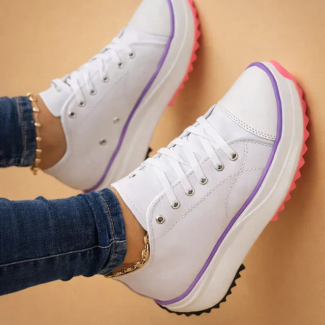 Stylish women's lace-up sneakers for everyday comfort. Low-top casual footwear.