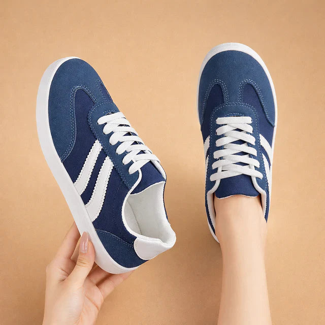 Comfortable women's sneakers with secure lace-up closure, ideal for an active, stylish everyday lifestyle.
