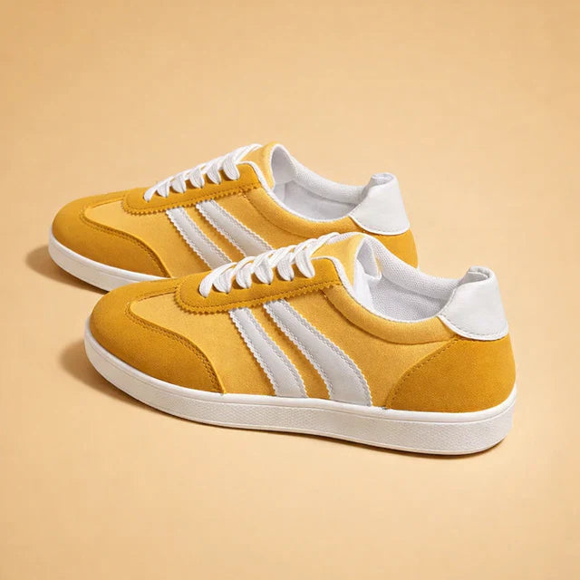 Comfortable women's athletic sneakers with durable sole, providing excellent grip for active lifestyles.