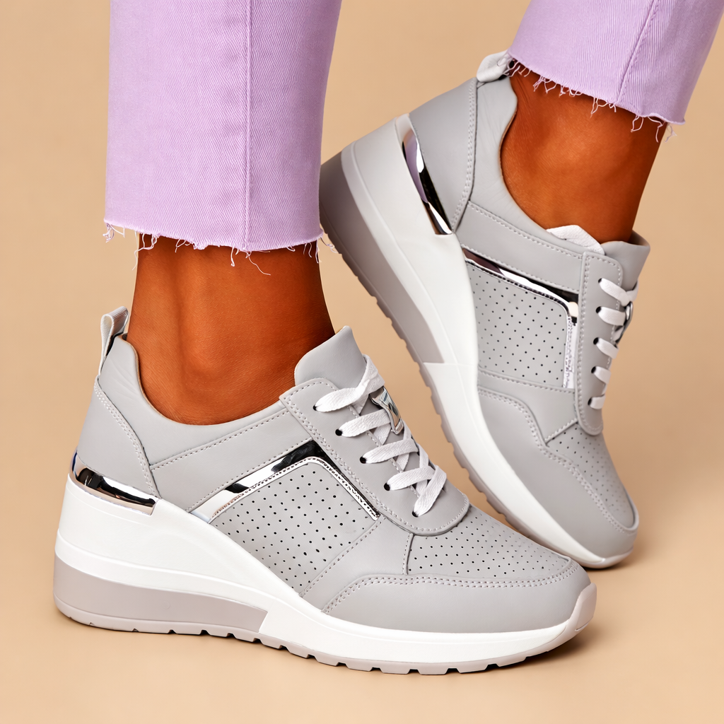 Stylish women's lace-up sneakers with side zipper, perfect for chic everyday comfort and casual walking.