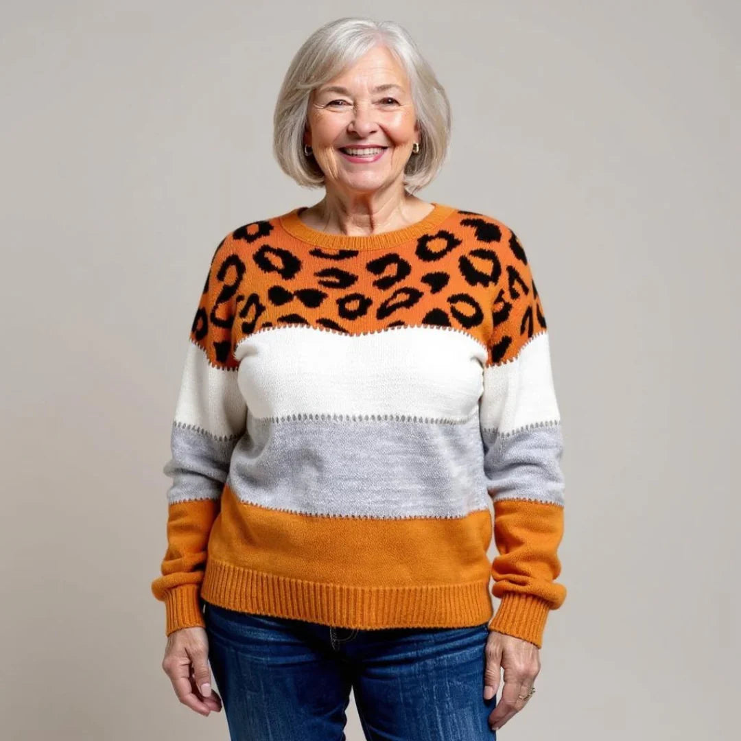 Fashionable women's leopard print top. Cozy long sleeve crew neck sweater, perfect for casual autumn & winter wear.