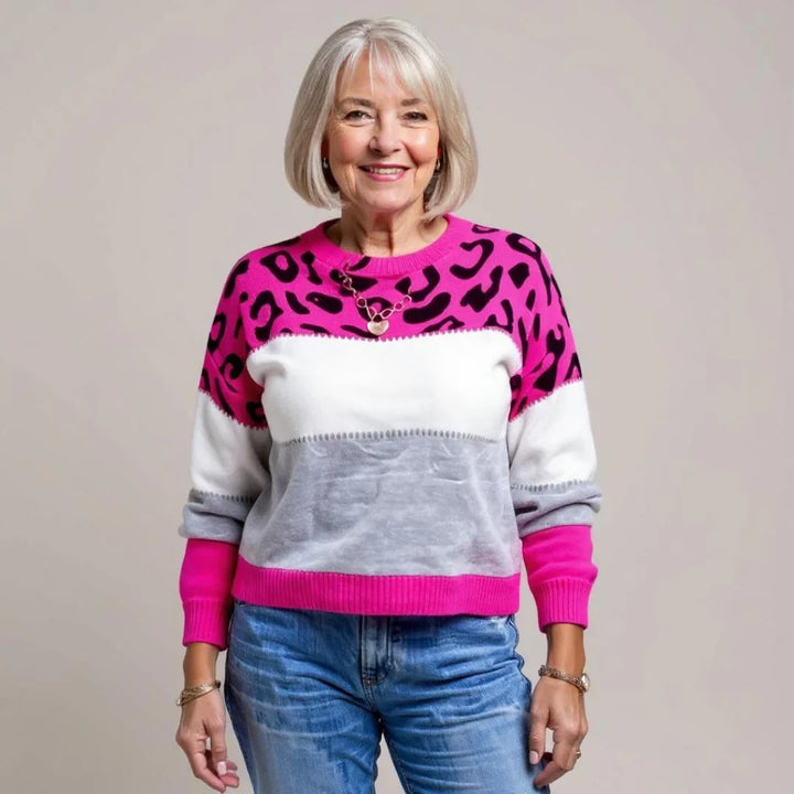 Autumn/winter women's leopard print sweater. Stylish, cozy long sleeve casual top with a classic crew neck.
