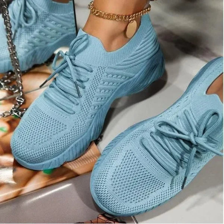 New women's lightweight lace-up sneakers featuring a breathable mesh upper, perfect for walking & casual comfort.