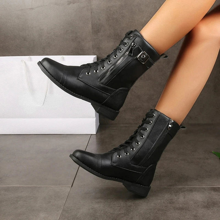 Comfortable women's mid-calf boots with lace-up detail & side zipper. Perfect casual fall/winter footwear.