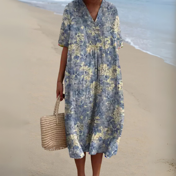 Women's V-neck summer dress, long and elegant with a lively multicolored design.