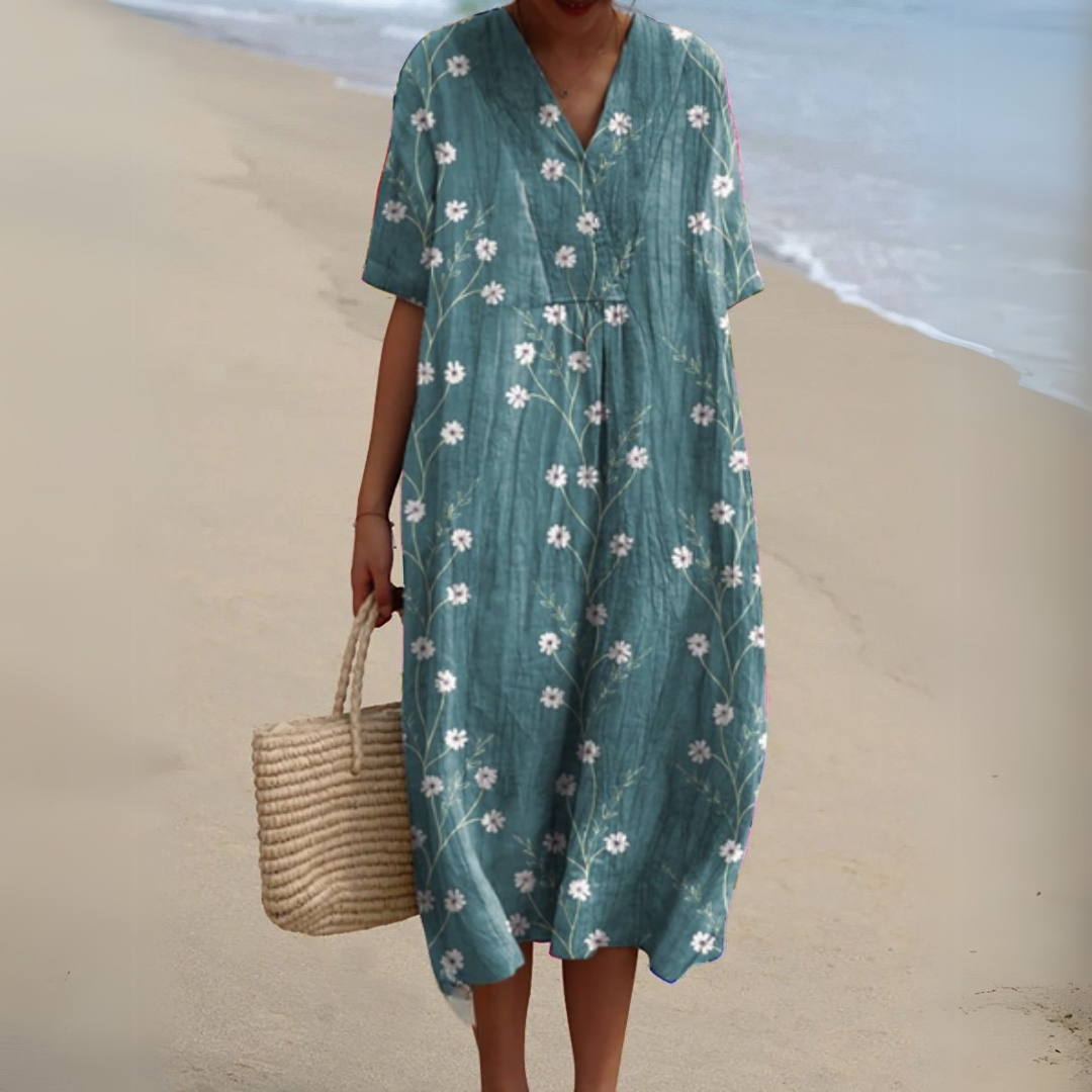Bohemian floral V-neck maxi dress for women, vibrant and ideal for vacation.