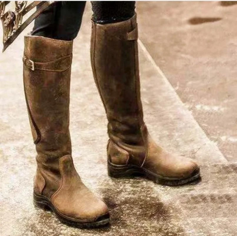 A pair of black Nova women's waterproof ankle boots, ready for fall, winter & outdoor use.