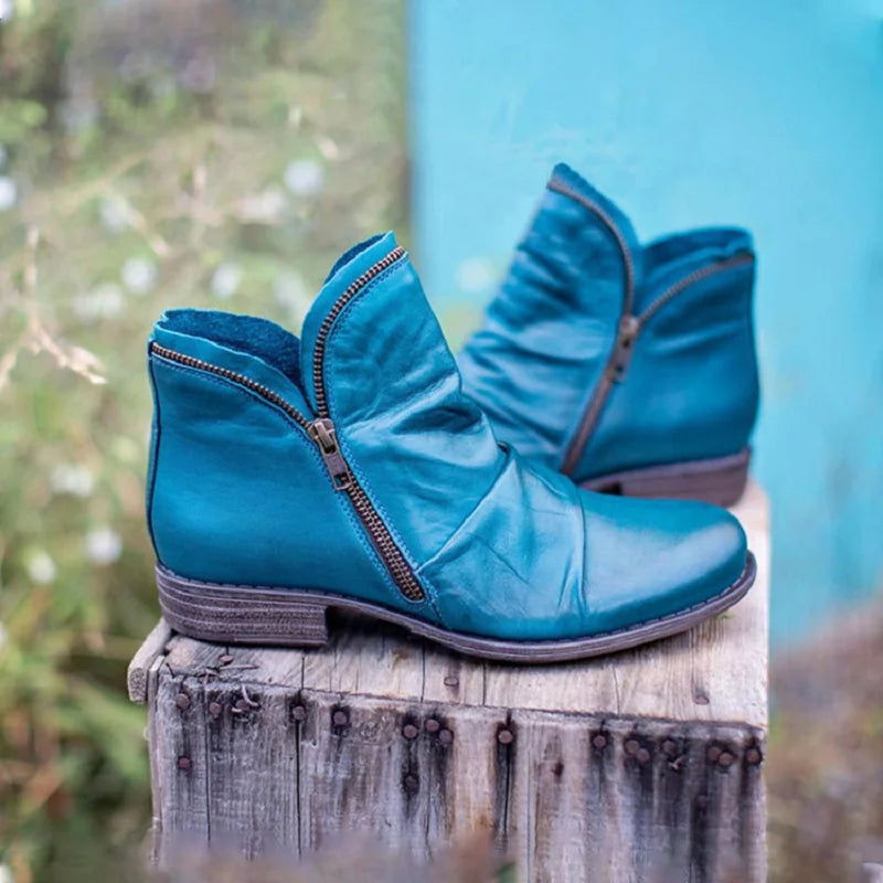Stylish women's orthopaedic ankle boots with arch support for superior comfort and stability.