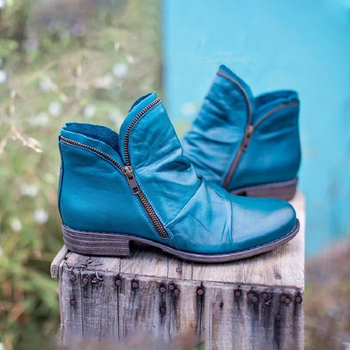 Stylish women's orthopaedic ankle boots with arch support for superior comfort and stability.