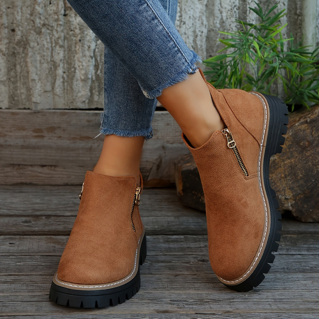 Experience all-day comfort with these stylish orthopaedic women's boots featuring arch support.
