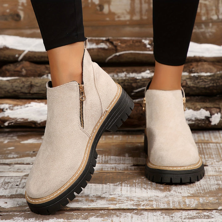 Women's orthopaedic fashion boots with a side zipper, cushioned comfort, and slip-resistant sole.