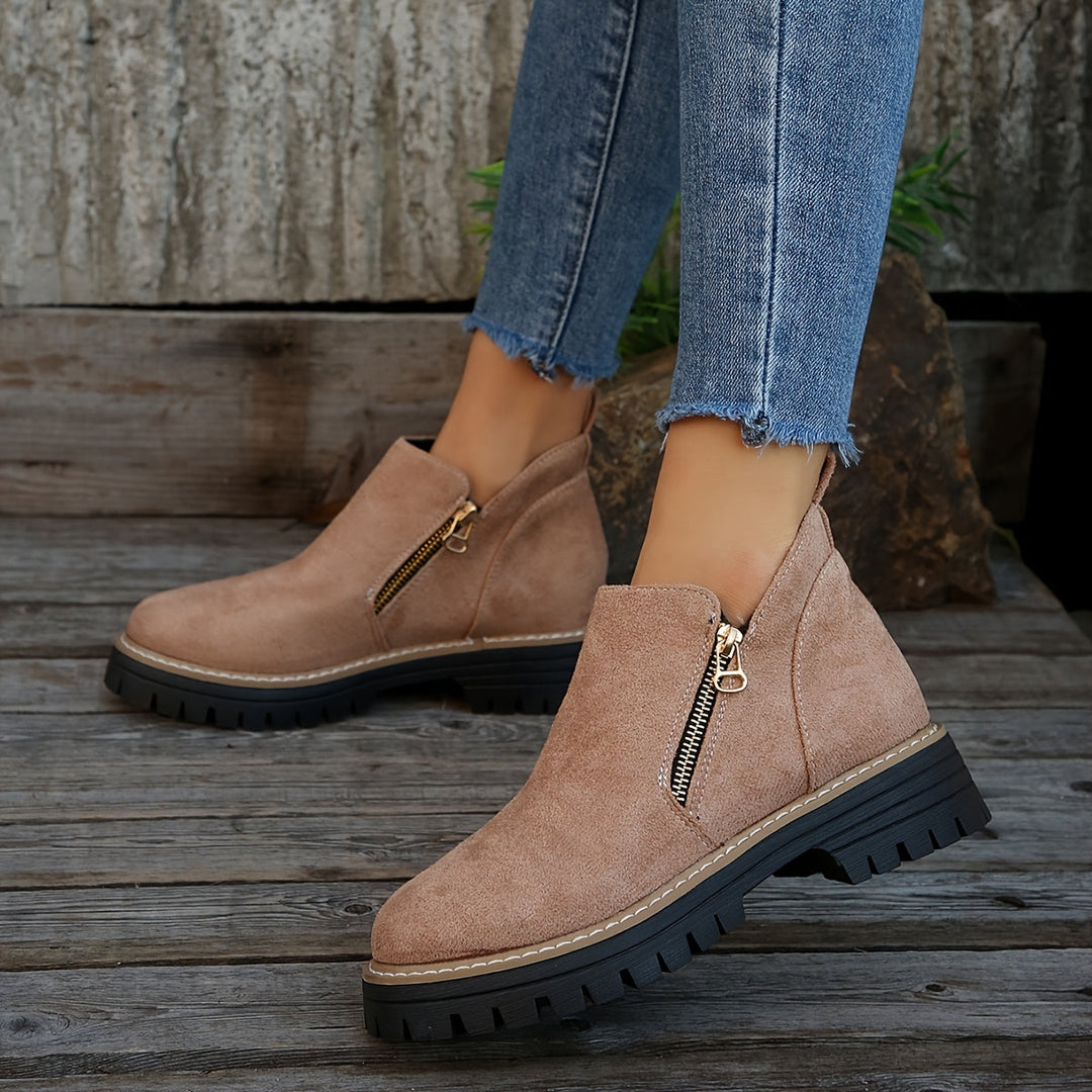 Stylish orthopaedic women's ankle boots with arch support, cushioning, & slip-resistant sole.