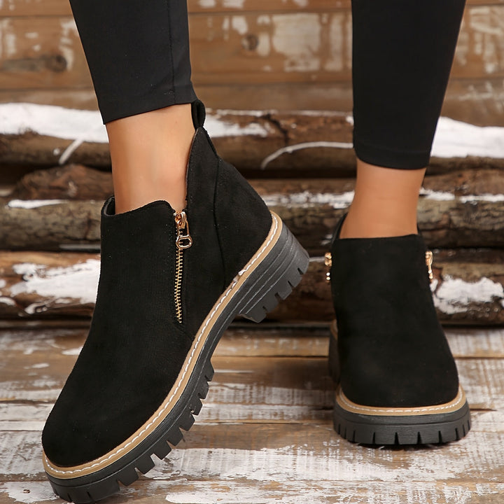 Orthopaedic women's ankle boots featuring arch support, cushioning, & a convenient side zipper.