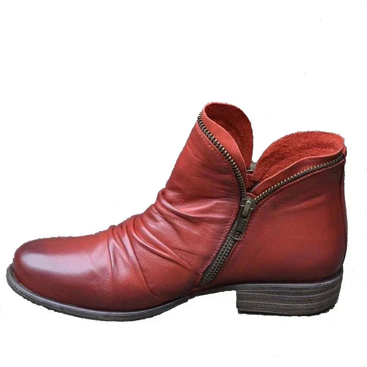 Fashionable women's winter ankle boots with built-in orthopaedic arch support for lasting comfort.
