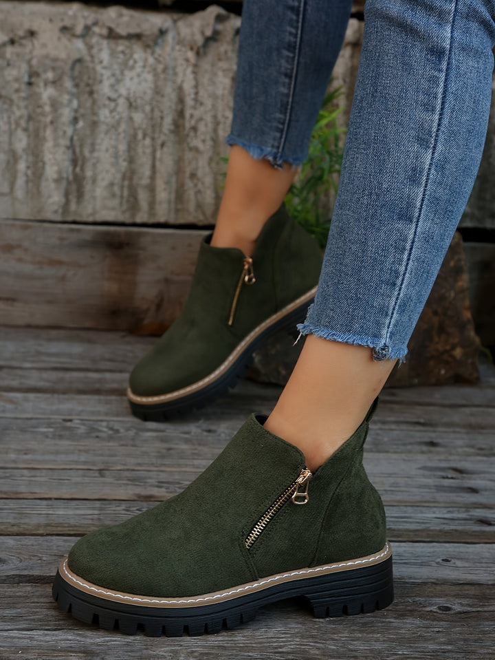 Fashionable women's orthopaedic boots with practical slip-resistant sole & supportive design.