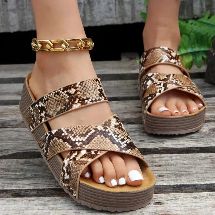 Comfortable women's orthopaedic sandals for foot health. Stylish everyday slip-on design with arch support.
