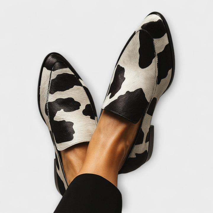 Stylish women's orthopaedic support loafers, cushioned for all-day comfort. Flexible slip-on footwear.