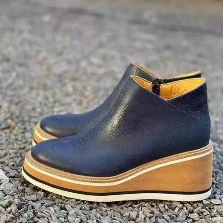Modern women's fashion ankle boots, orthopedic features for superior comfort and support.