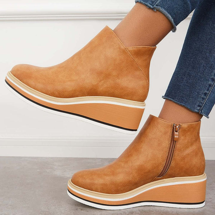 Comfortable women's ankle boots with orthopedic support, stylish for all seasons.