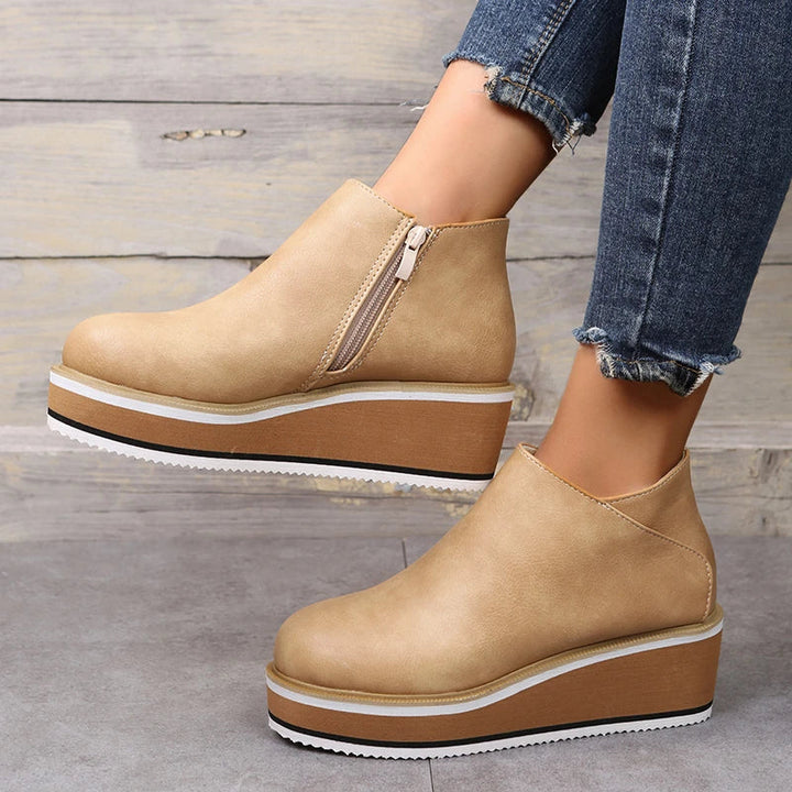 Sleek women's orthopedic ankle boots, perfect for stylish comfort and support.
