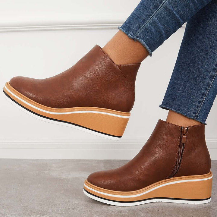 Supportive women's fashion ankle boots, orthopedic for everyday stylish comfort.
