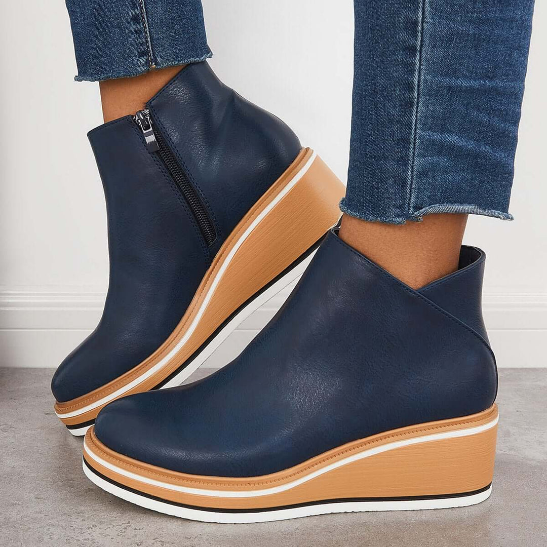 Women's orthopedic ankle boots, sleek design, offering superior comfort and support.