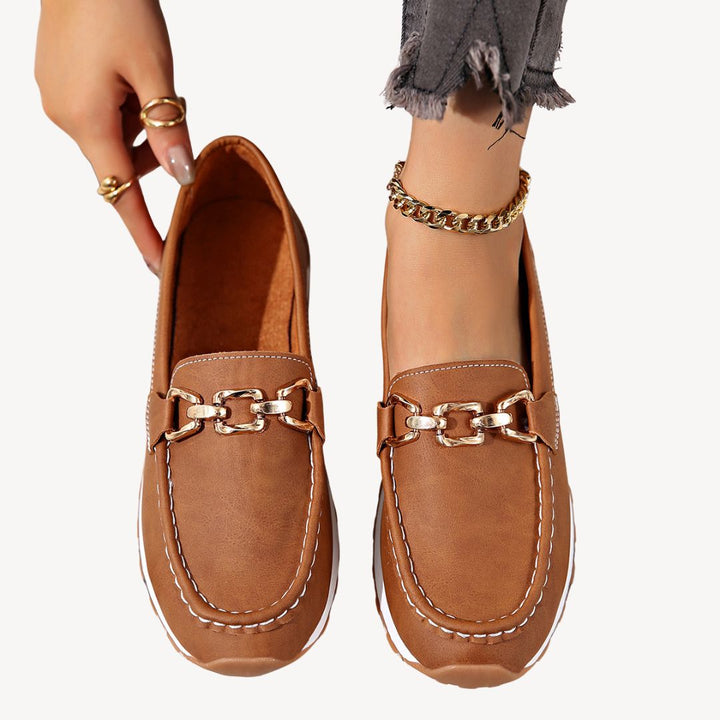 Versatile women's orthopedic loafers with a decorative chain, suitable for formal or casual outfits, comfy arch support.