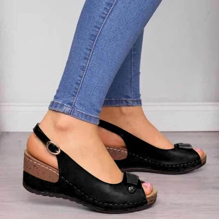 Adjustable women's orthopedic sandals, offering arch support and supreme comfort for daily wear & improved foot health.