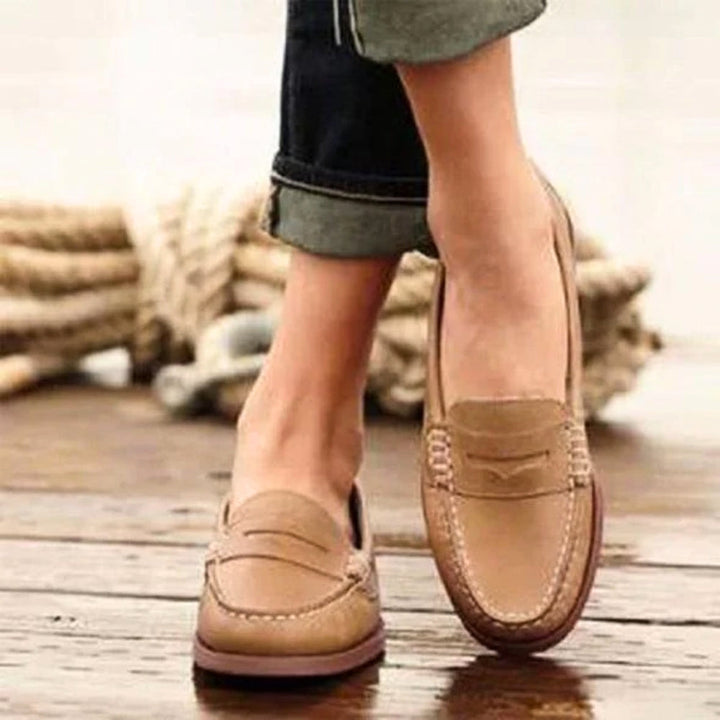 Stylish women's orthopedic slip-ons with cushioned comfort & arch support. Perfect casual footwear for walking.