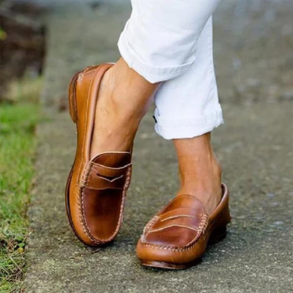 Easy-wear women's orthopedic slip-on shoes. Cushioned comfort & versatile support for casual everyday walking.