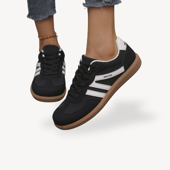 Comfortable women's orthopedic walking shoes, lace-up design with stylish contrast accents.