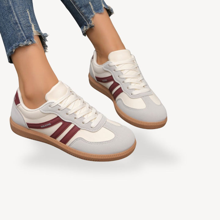 Lace-up women's orthopedic sneakers in a stylish design with eye-catching contrast accents for comfort.