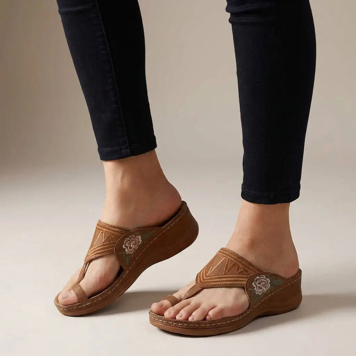 Stylish women's orthopedic wedge thong sandals, featuring elegant floral embroidery for summer comfort.