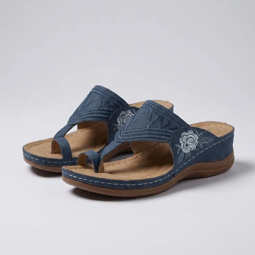 Fashionable women's orthopedic wedge sandals. Floral embroidered thong design ensures stylish comfort & support.