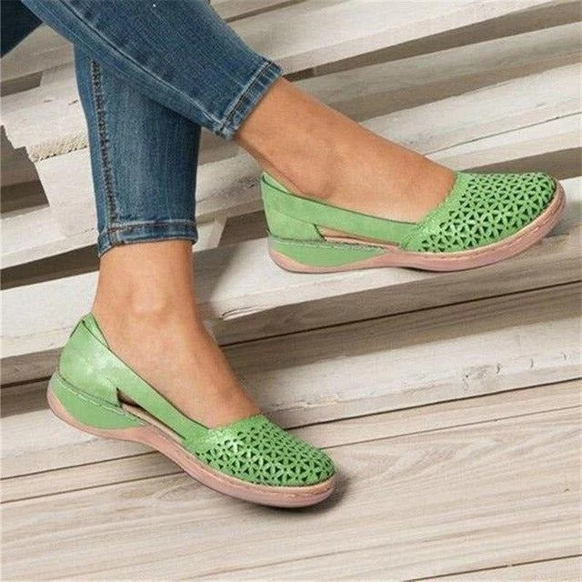 Stylish women's perforated wedge cutout sandals, perfect slip-on summer footwear for casual comfort & fashion.