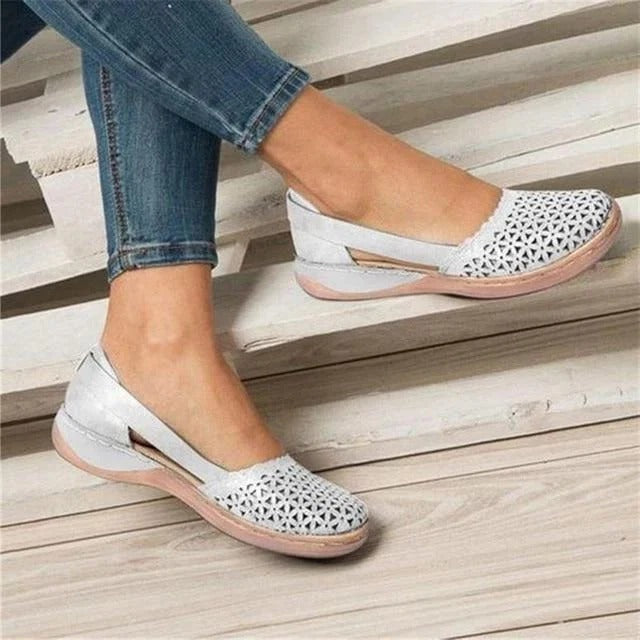 Comfortable women's wedge sandals with chic perforated & cutout design, ideal slip-on summer casual shoes.