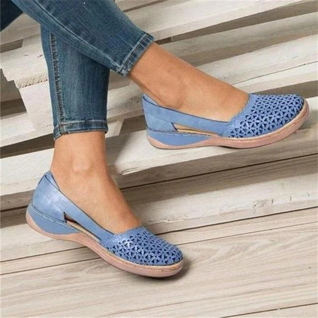 Versatile women's perforated wedge cutout sandals, comfortable slip-on summer footwear for everyday casual wear.