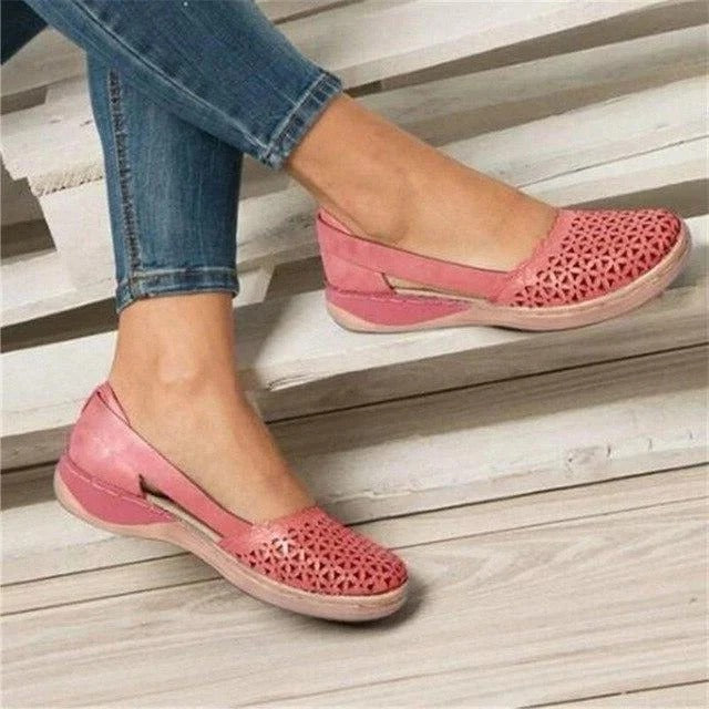 Trendy women's perforated wedge cutout sandals, a comfortable slip-on fashion choice for summer casual shoes.
