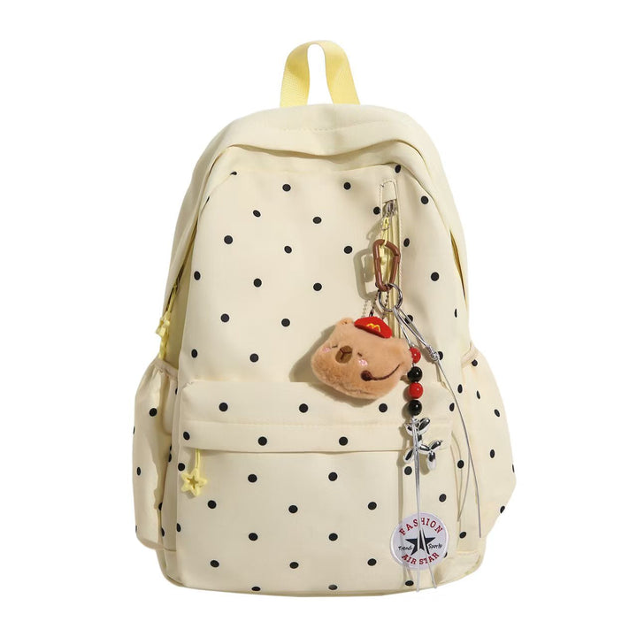 Trendy women's polka dot travel backpack, embellished design ideal for school, daily use & fashion.