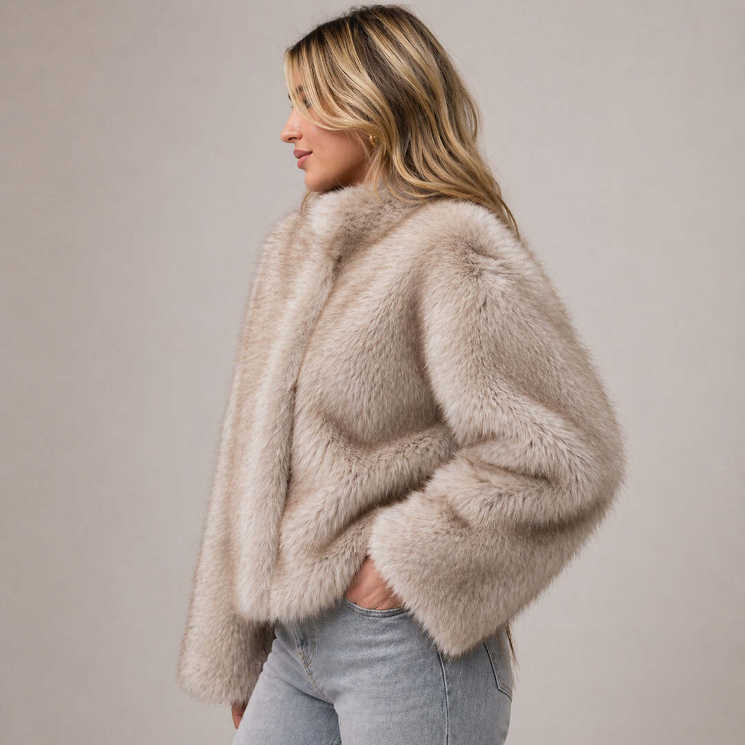 Relaxed fit women's winter jacket, providing warm and stylish outerwear for both casual & evening wear fashion.