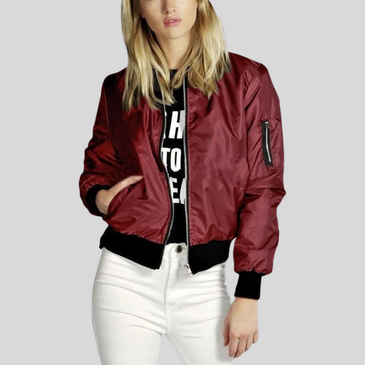 Versatile women's bomber jacket with ribbed trim, ideal for layering and stylish casual spring outfits.