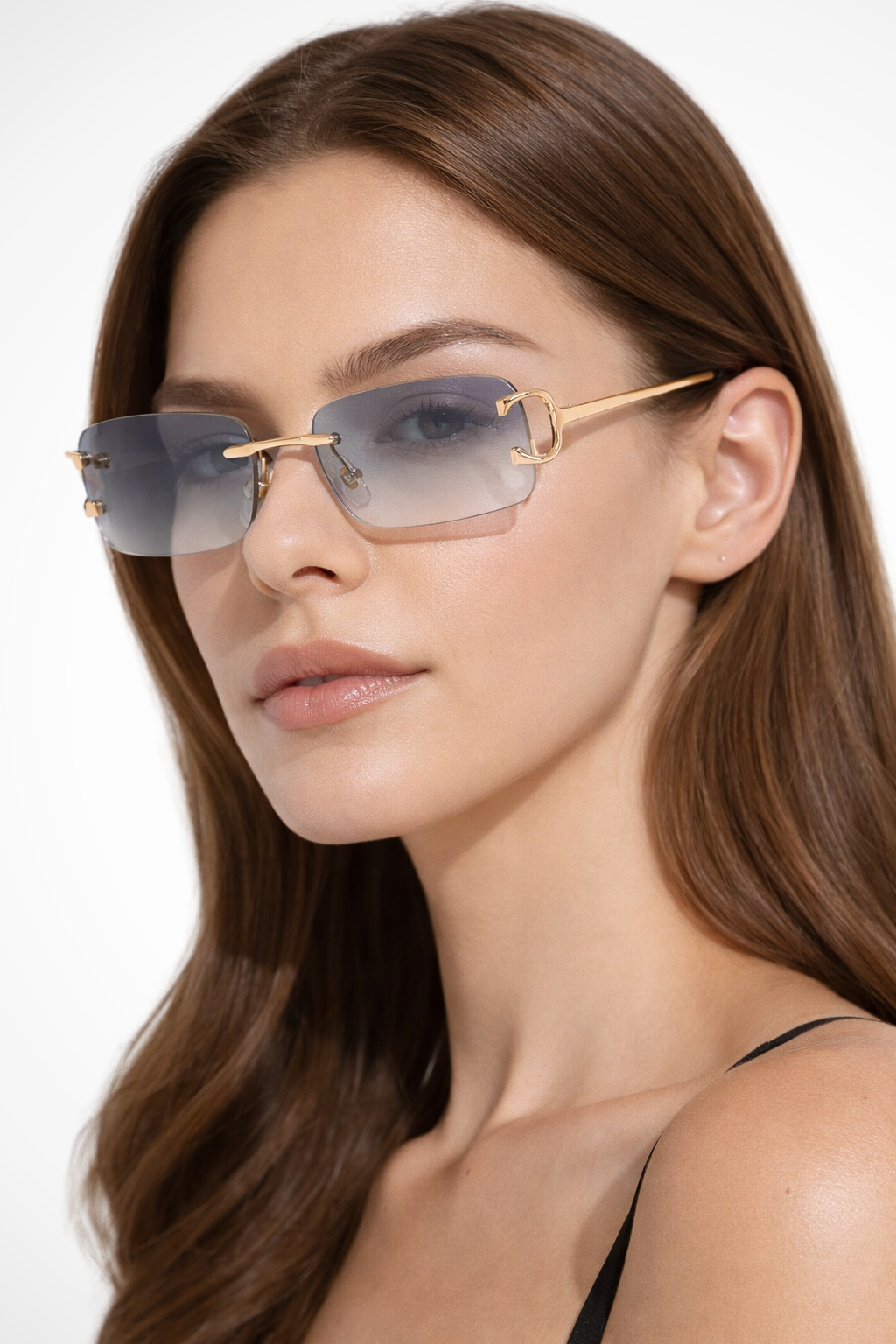 Elegant women's rimless rectangle sunglasses, sleek gold frames, perfectly tinted lenses, a sophisticated fashion item.