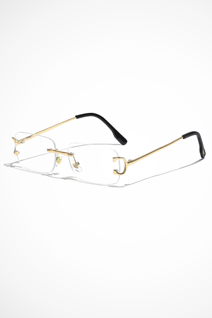 Contemporary women's rimless rectangle sunglasses with tinted lenses & shiny gold frames, perfect modern eyewear.