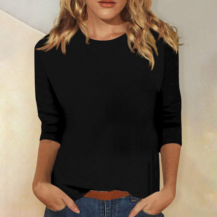 Stylish women's round neck quarter sleeve top. Lightweight & versatile for summer casual wear.