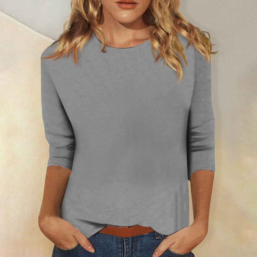 Women's round neck, quarter sleeve top. A lightweight, stylish choice for summer and versatile wear.