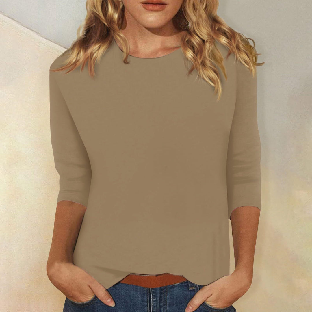 Trendy women's round neck quarter sleeve top. Perfect lightweight & versatile wear for warm weather.